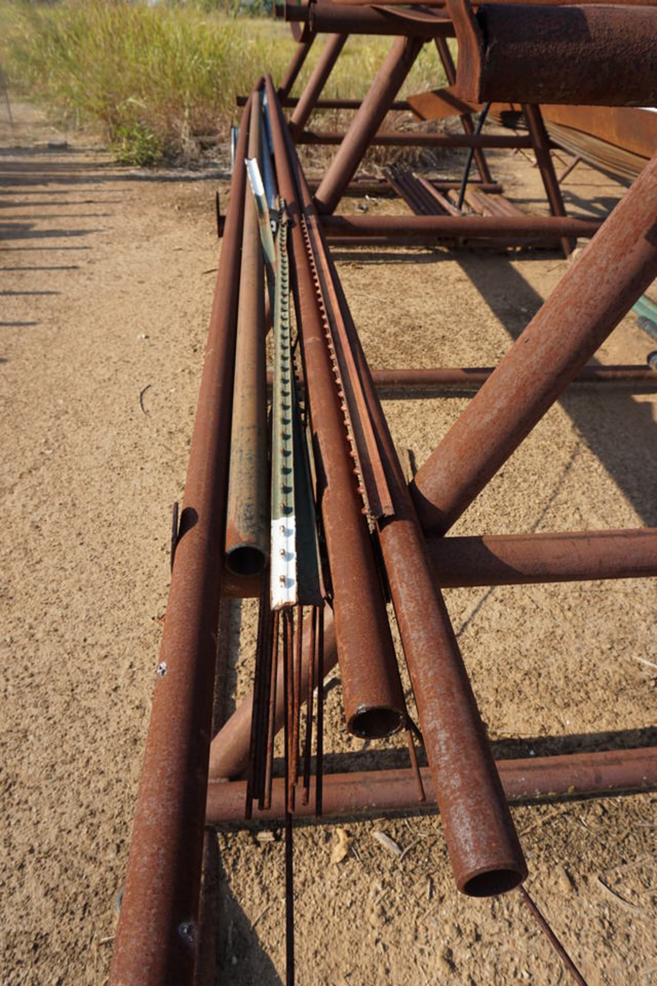 A FRAME MATERIAL RACK APPROX 6'W X 6' TALL W/ ASSORT PIPE & FLAT STOCK - Image 2 of 5