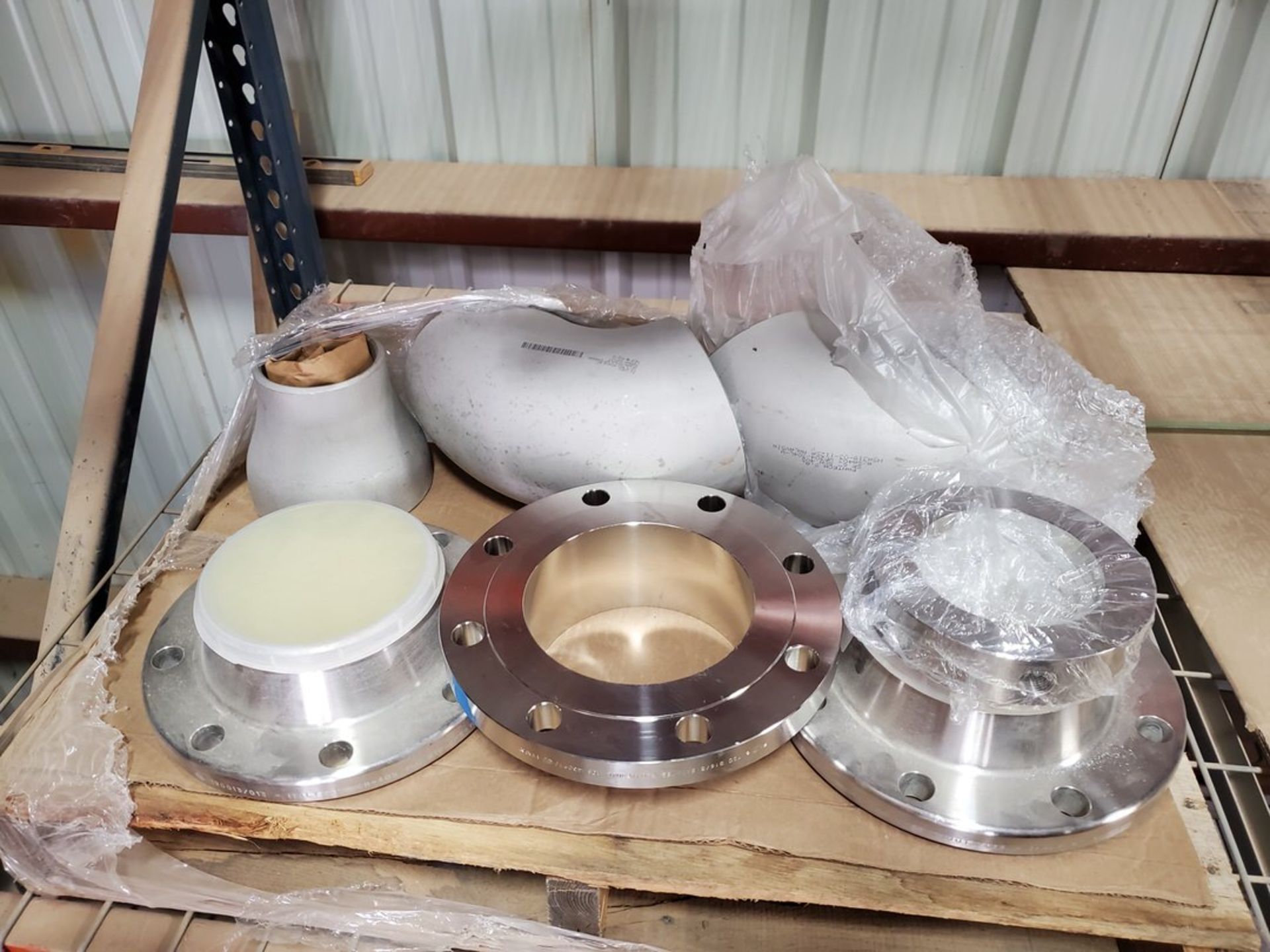 Assorted Fittings (3) 6" 150# Flanges Sch 40, (1) 6" Ell 304 Sch 40S, (1) Reducer, (1) Bleed Ring