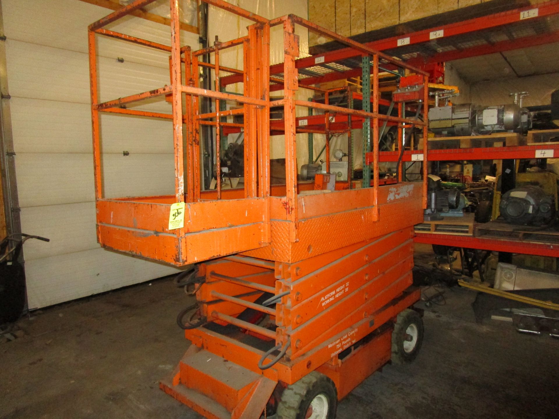 Orange Electric Scissor Lift, 28" Work Platform, 22' Height, 750 # Cap, (Needs Repair)