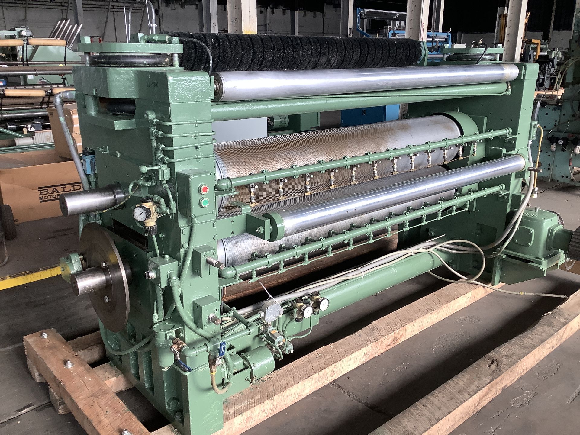 69” PCMC matched steel-to-steel embossing system. Model M1206. Unit was inline with PCMC 200