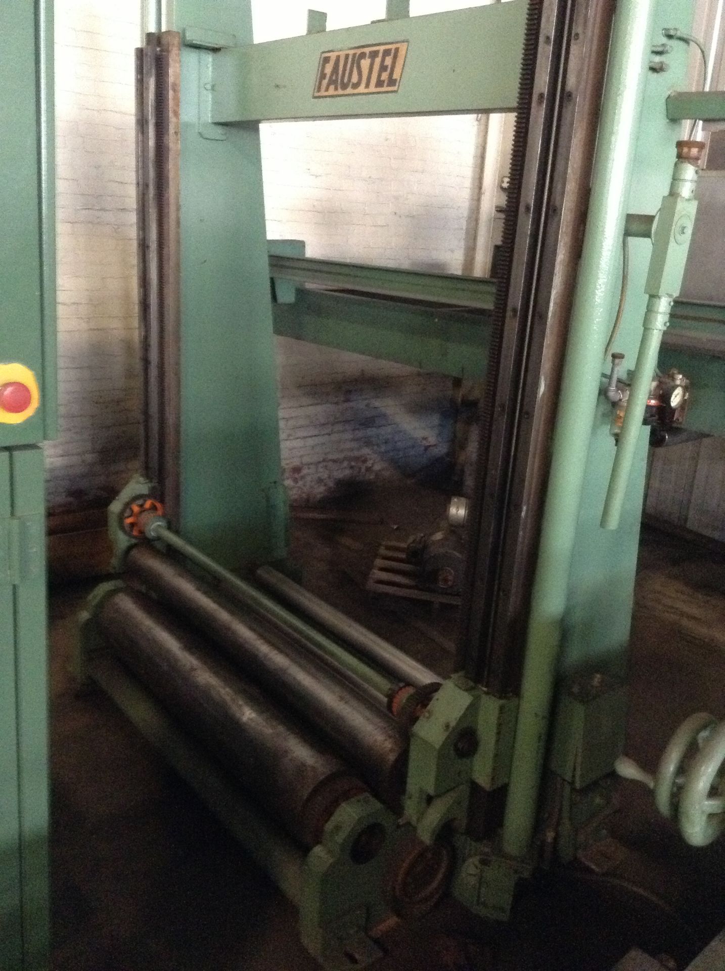 56" Faustel 2-drum surface rewind single shaft rewinder. Was inline with a laminator operating at