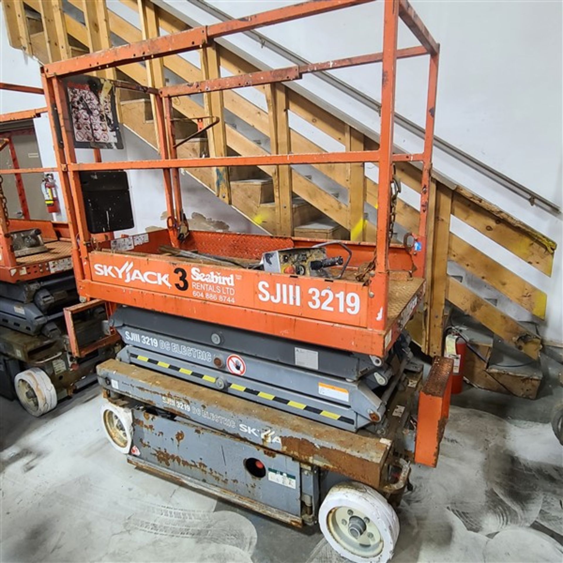 SCISSOR LIFT - SKYJACK SJ1113219, 550 LB. 2 PERSON, 24V, 19 FT. LIFT, S/N 22039061, METER READS