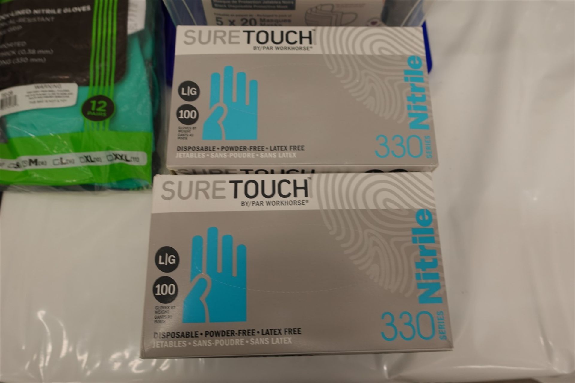 LOT OF SURE TOUCH DISPOSABLE POWDER FREE GLOVES, MASKS ETC. - Image 3 of 3