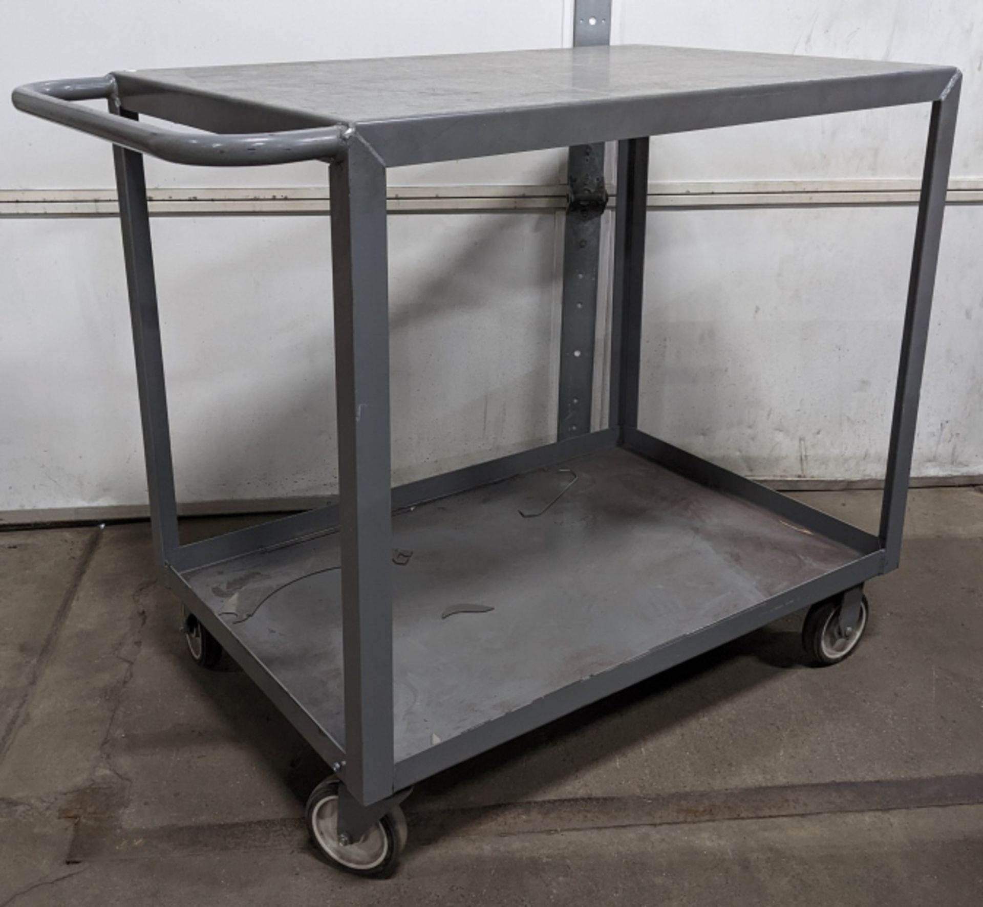 Uline Metal Two Tier Utility Cart. Surface