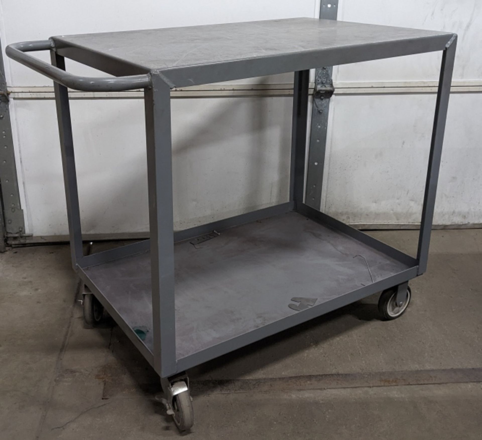 Uline Metal Two Tier Utility Cart. Surface