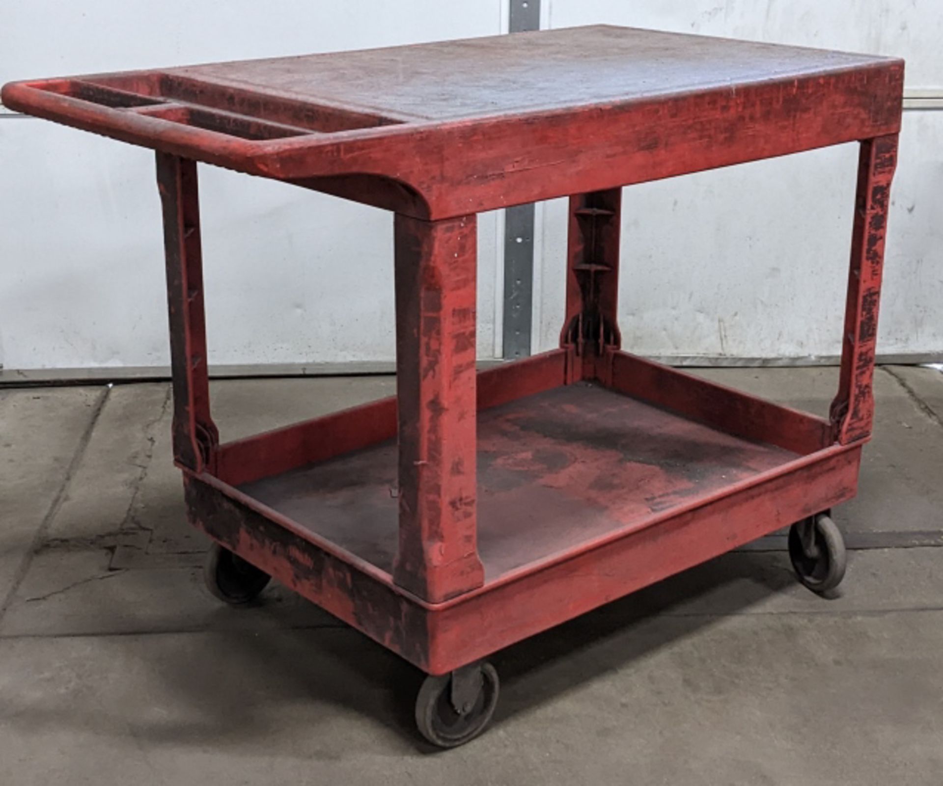 Uline Plastic Two Tier Utility Cart. Surface