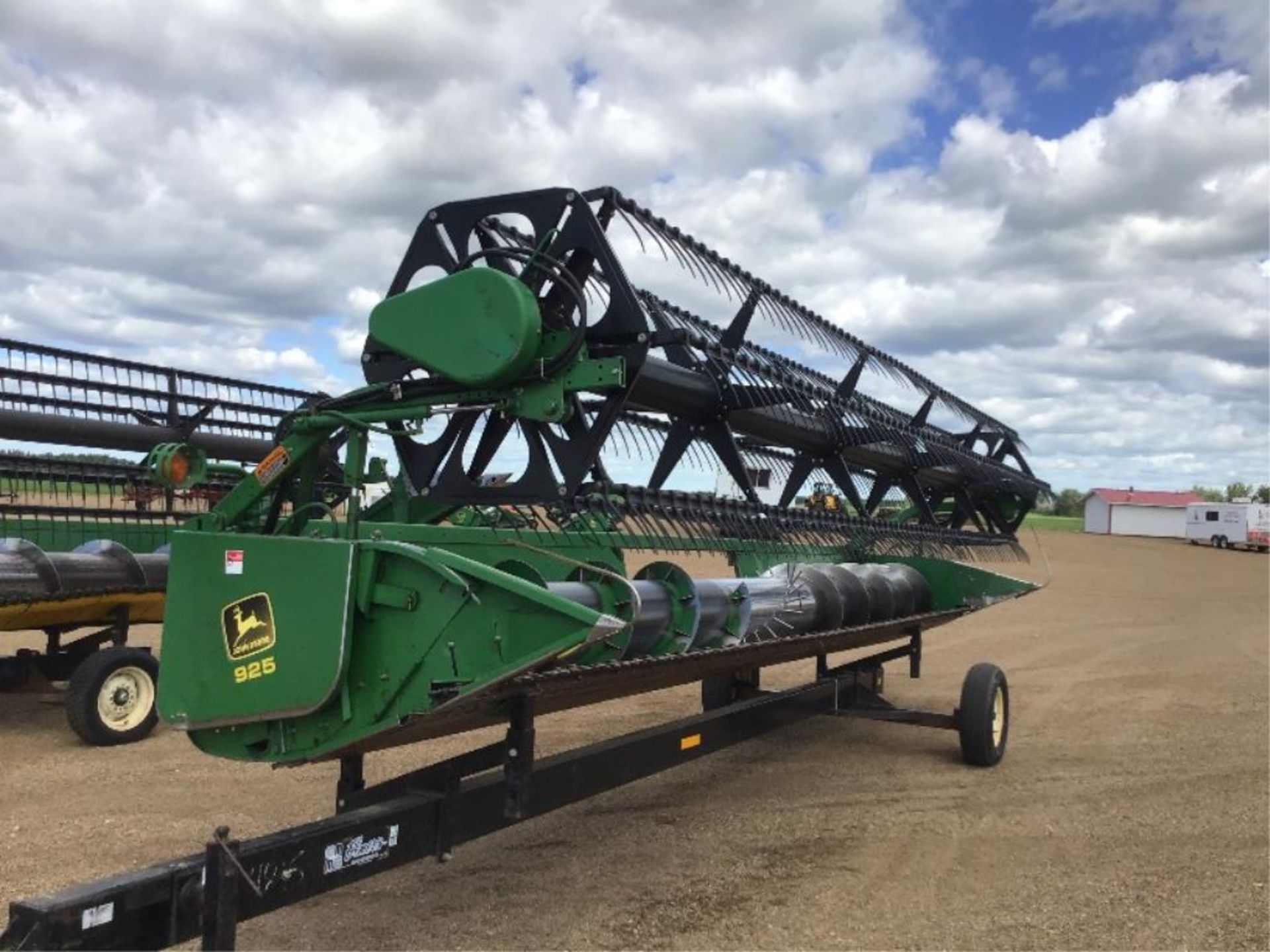 John Deere 925 Rigid Header Plastic Tines on P/U Reel. (Header Transport Sells Seperate)