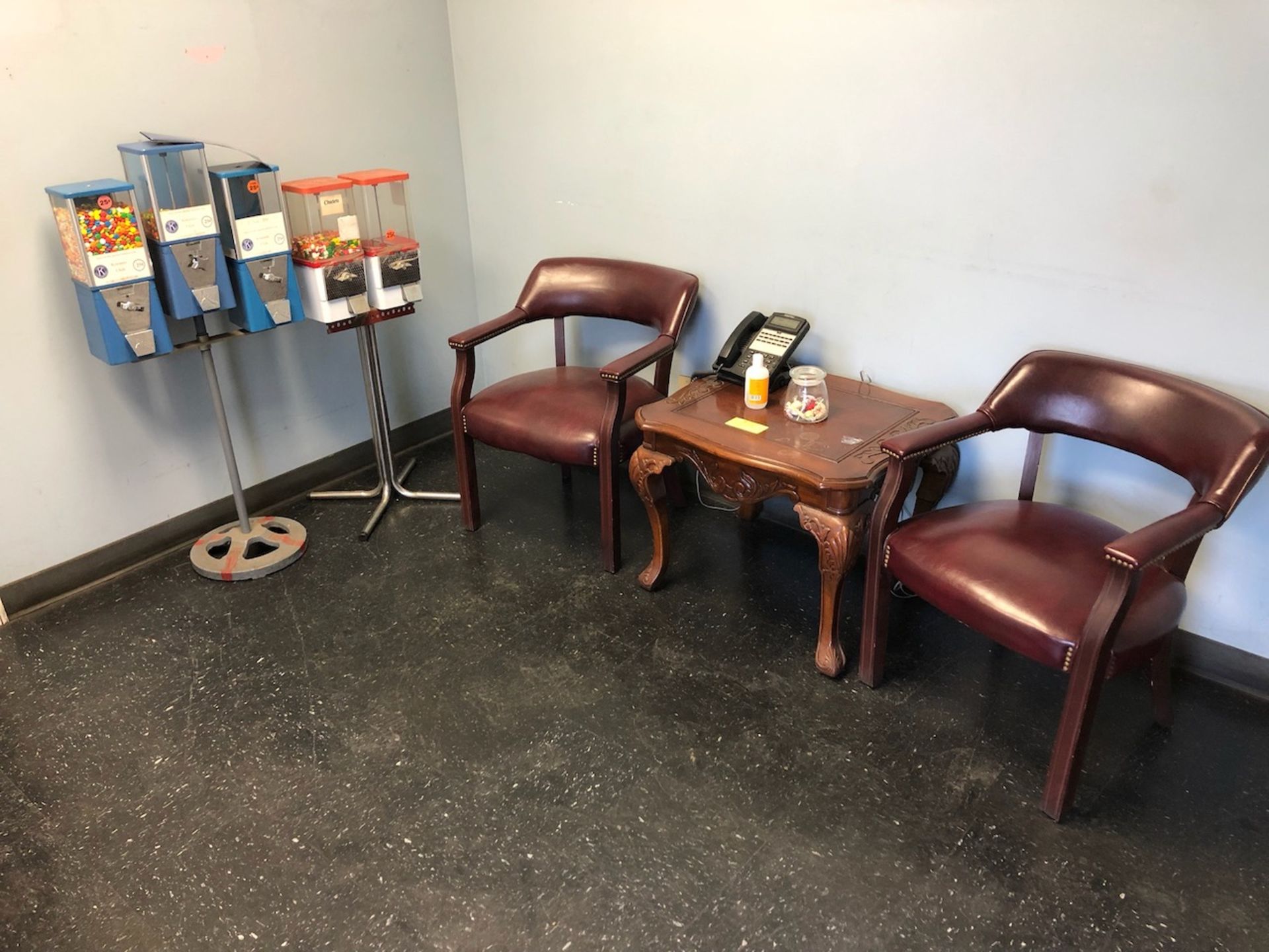 Contents of Entry Room to include 2 Candy Machines/2 Chairs/Table/Phone