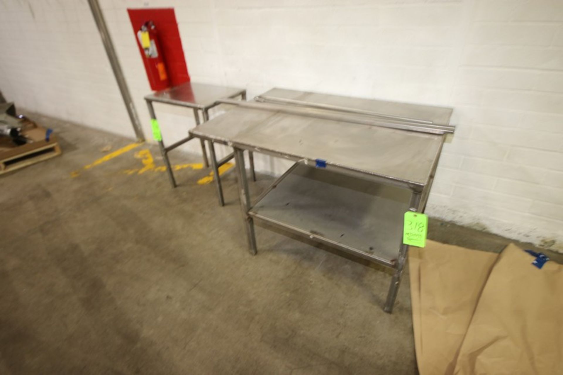 (2) S/S Tables, Includes 1-Aprox. 24" L x 18" W x 32" W & 1-Aprox. 48" L x 36" W x 32" H (LOCATED IN