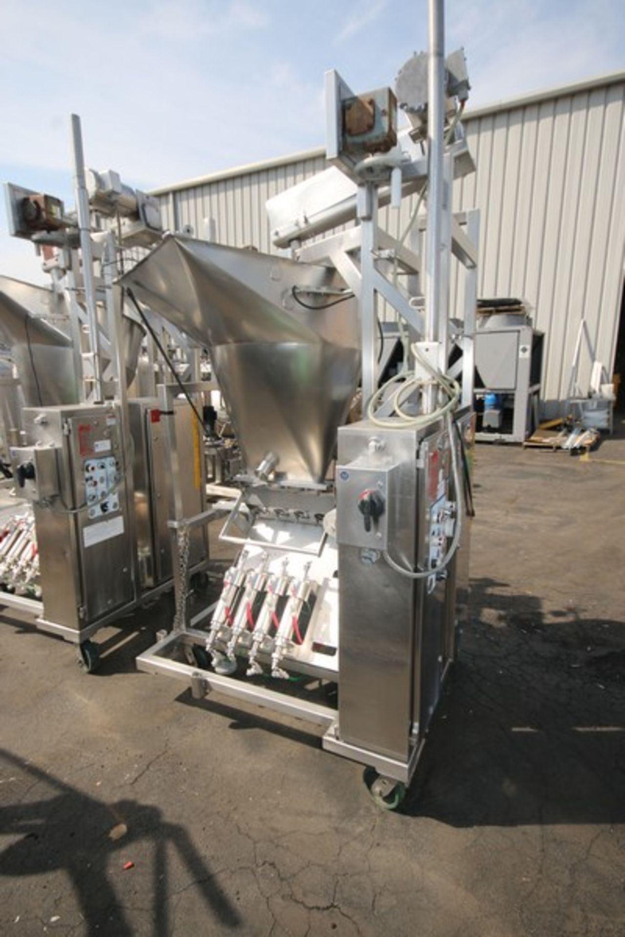 Raque S/S 4-Piston Filler,M/N PF2.5-4, S/N 1000164, with Hopper, 460 Volts, 3 Phase, Mounted on
