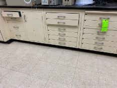 6 Lab cabinets + desk with 14'8" of black lab top / lab table & desk measure 14'8"Lx24"Dx31"H. Has