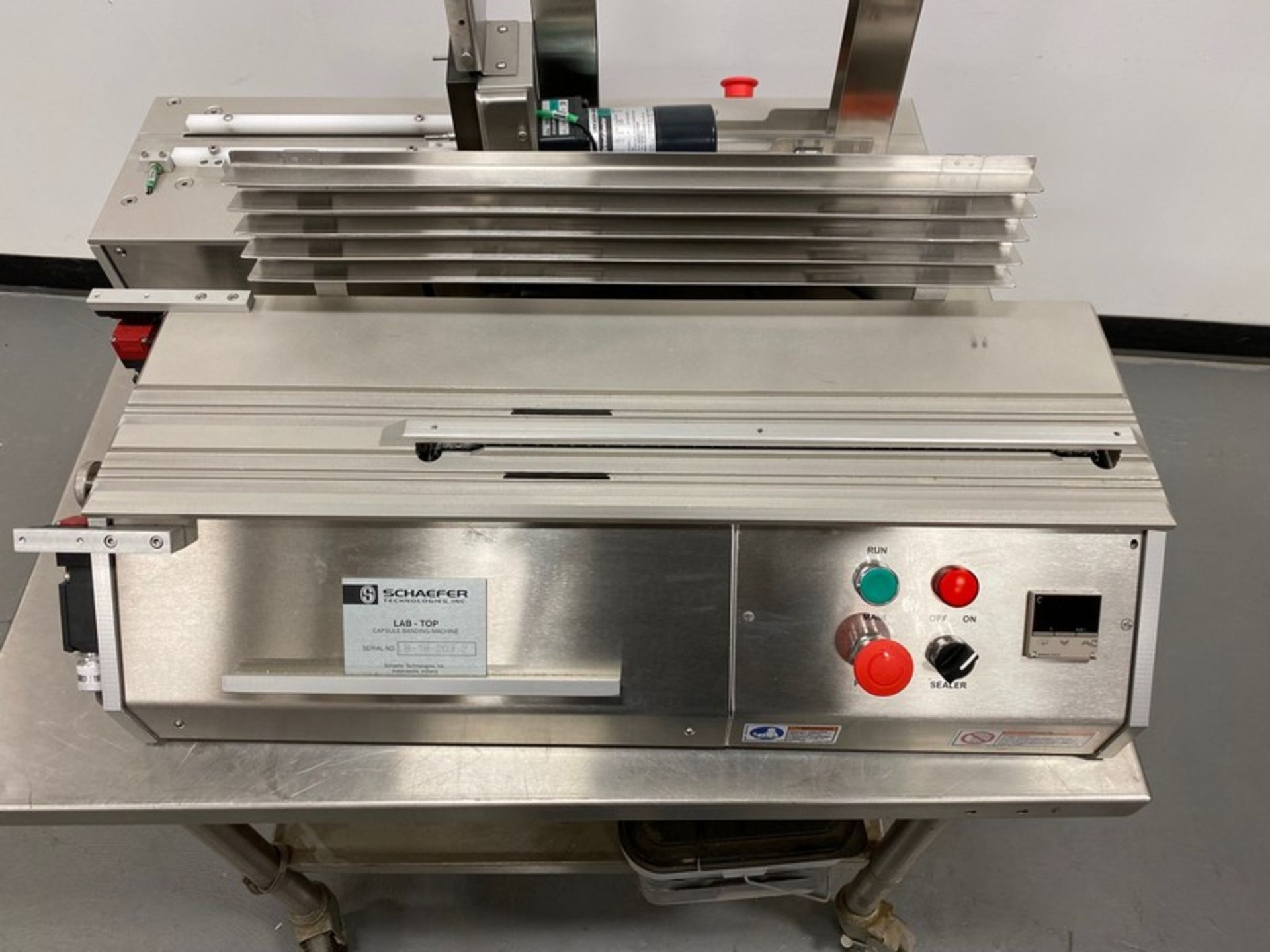 Schaefer Technologies Capsule Bander and Slat Loader. Capsule Bander: Model: Lab