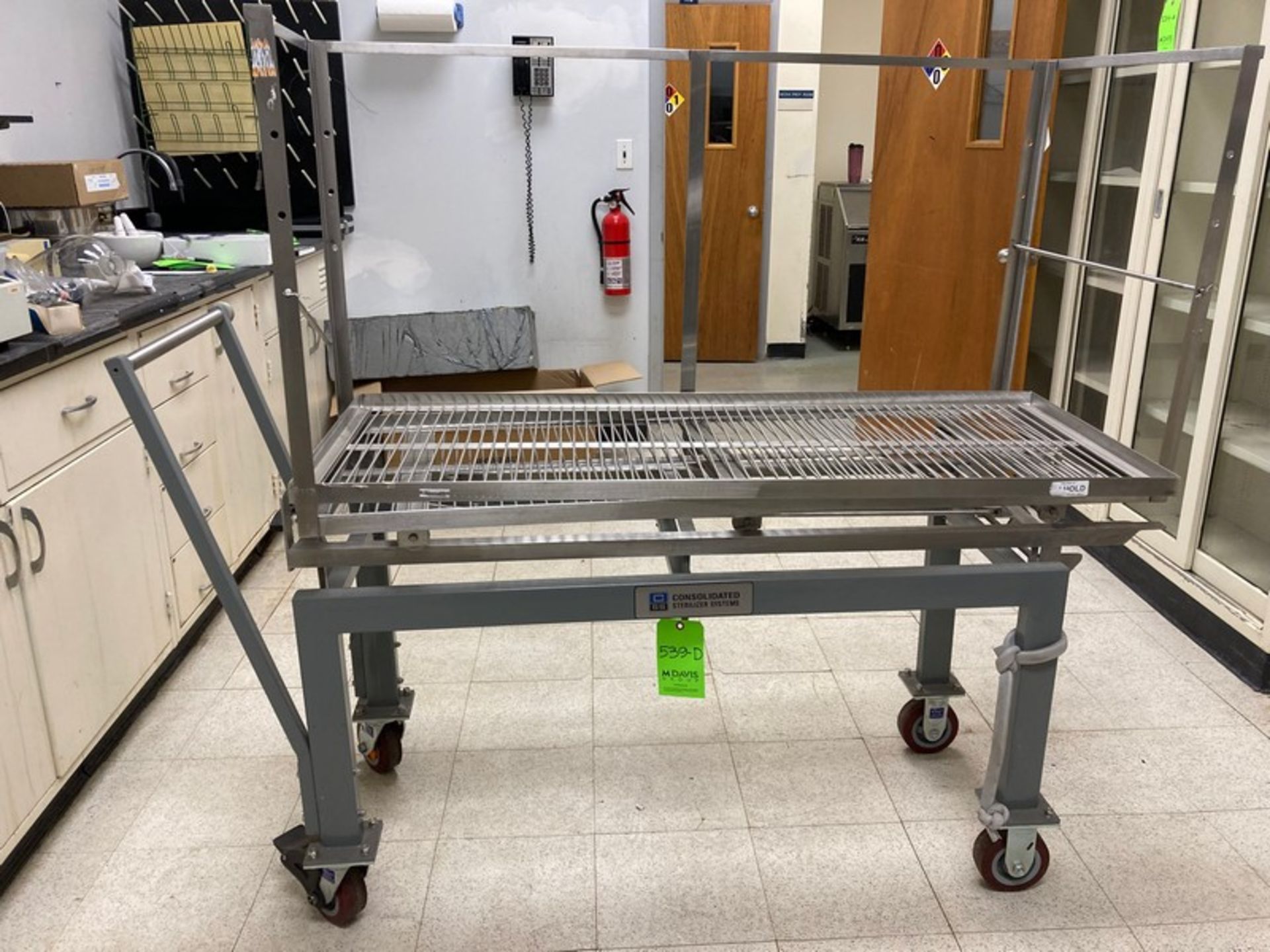 One(1) consolidated sterilizer Systems stainless Steel Cart with 2 shelves - cart 49"L+ handle x