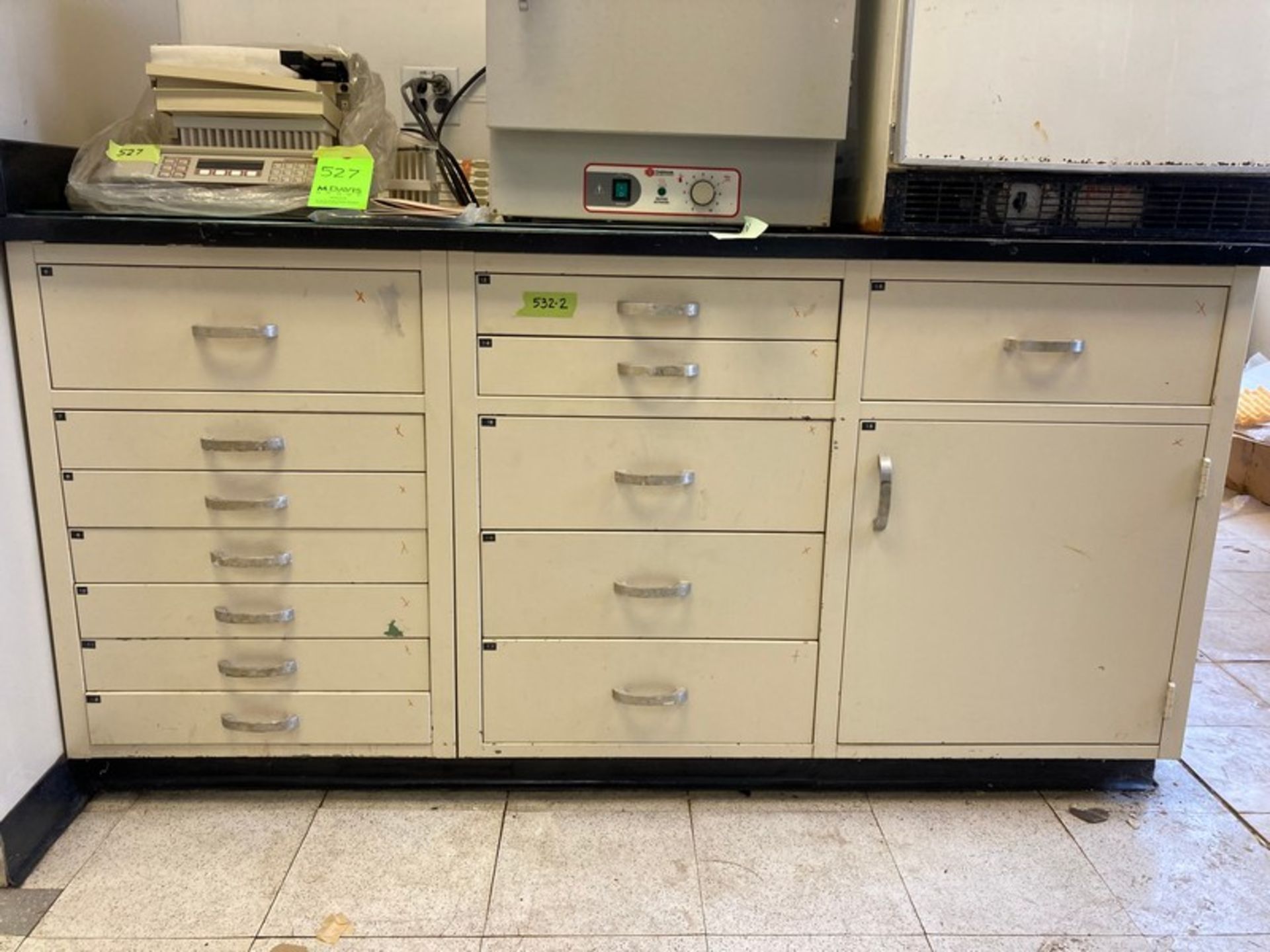 L-shaped Stone-Top center island Lab bench with 9 Base Cabinets with Approx 18 ft of worspace &