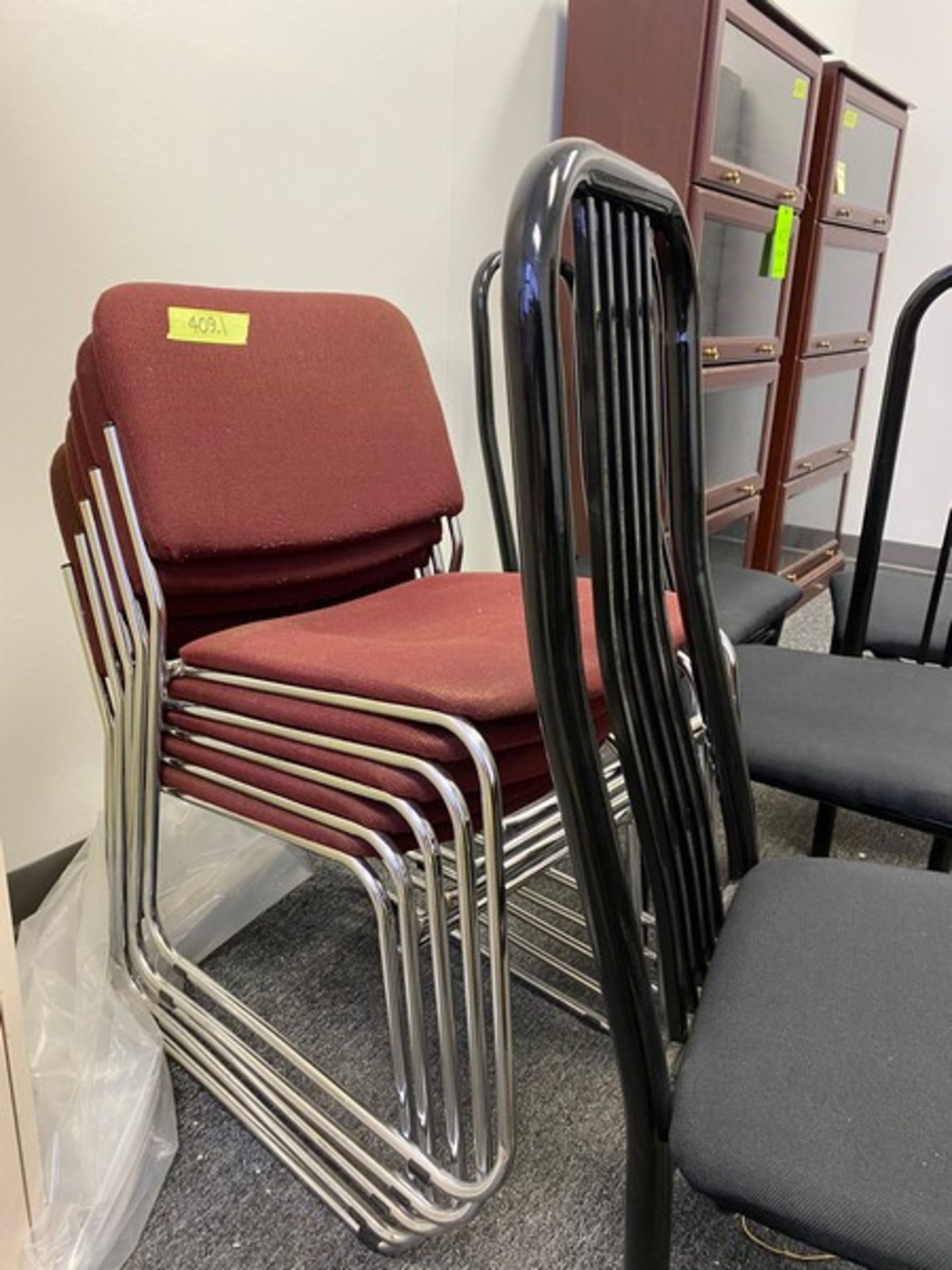 9 Chairs: 4 Black Table chairs and 5 Stackable Chairs (Elevator Handling Fee $20) (Located New - Image 4 of 6