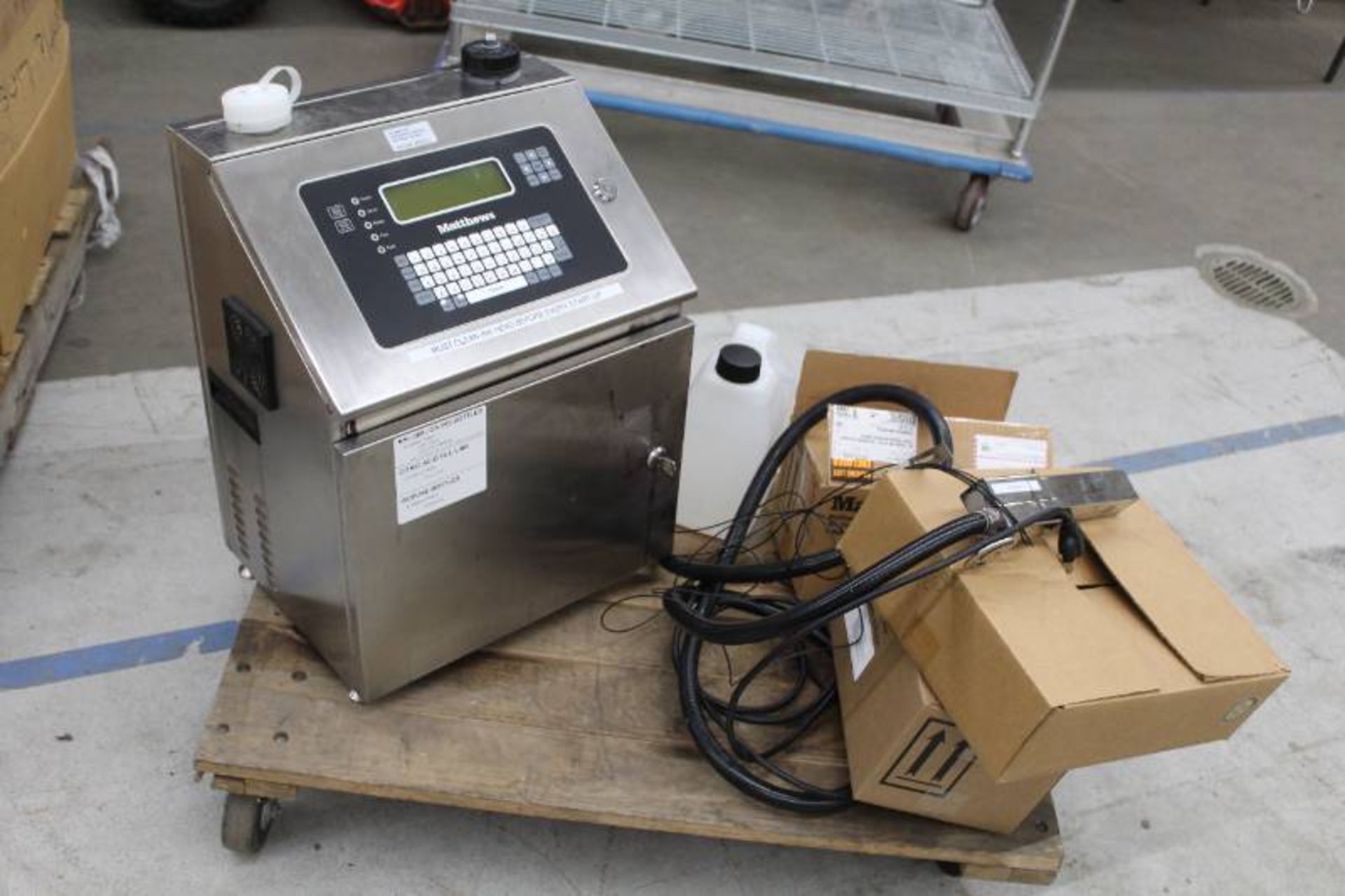 Mathews Ink Jet Coder. Model: CX16, Serial: 1009605, 100-240 Volts, 50-60 Hz, 2 Amp. As shown in