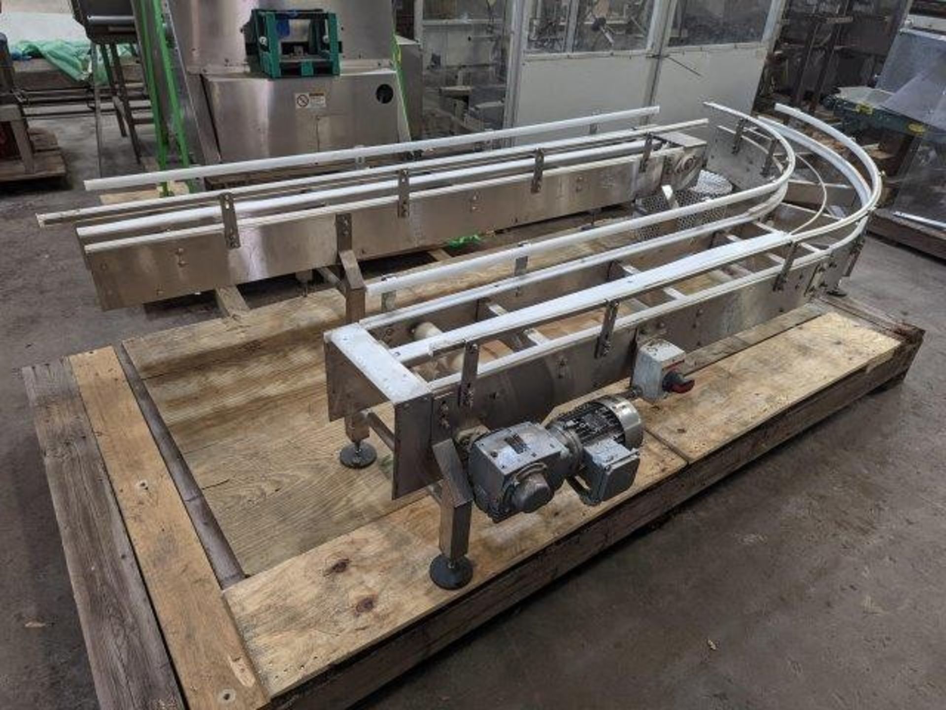 90-Degree Conveyor with Motor; 18' total length (10' for rounded 90 & 8' for straight piece; Some