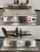 Schaefer Technologies Capsule Bander and Slat Loader. Capsule Bander: Model: Lab Top Capsule Banding