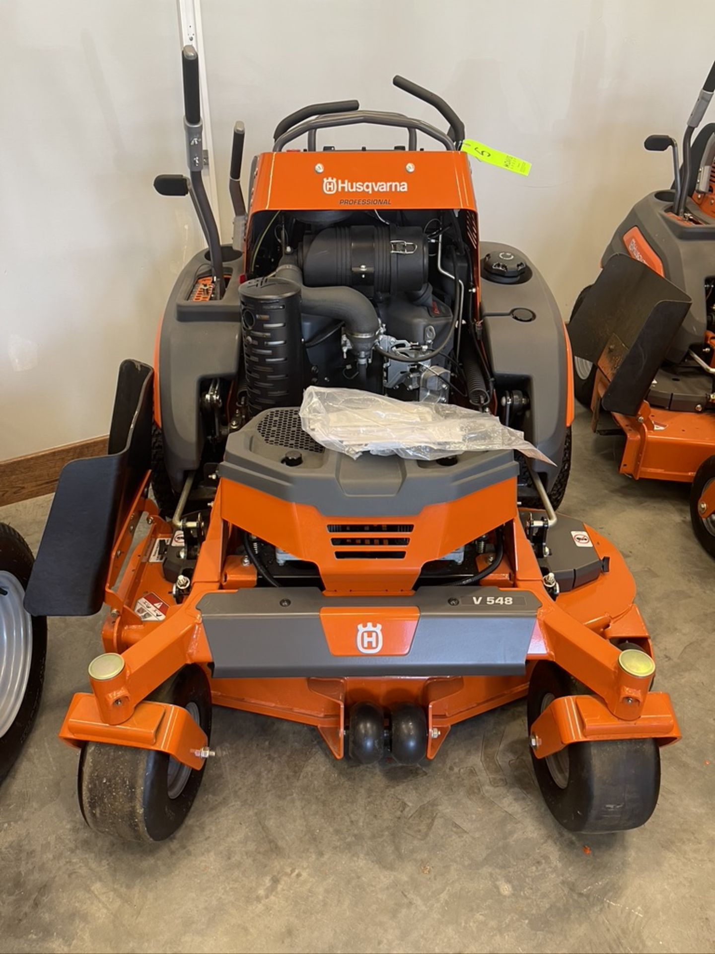 HUSQVARNA STAND-ON SERO-TURN MOWER, MODEL V548 (SEE TAG IN PHOTOS FOR MORE INFORMATION) (ALL