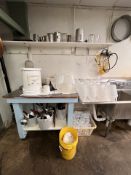 TABLE WITH S/S TOP MOUNTED ON CASTERS, ASSORTED KITCHEN SUPPLIES, INCLUDES KNIVES, SCOOPS, FUNNELS