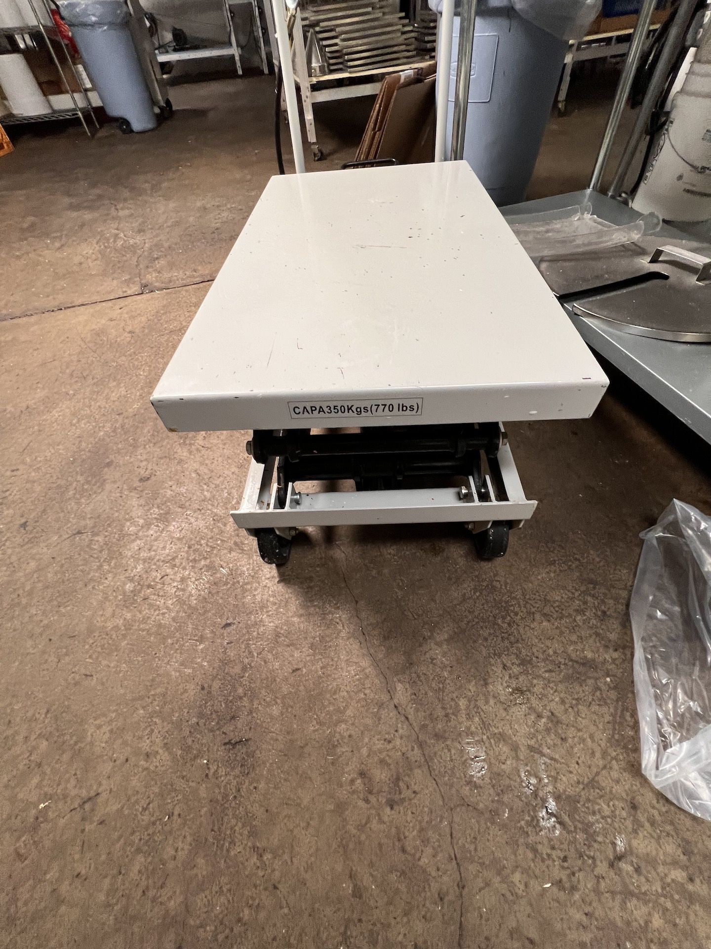 PORTABLE 770 LB PNEUMATIC LIFT TABLE WITH FOOT PEDAL, 116 PSI AIR PRESSURE, LIFTS TO APPROX. 36" - Image 2 of 5