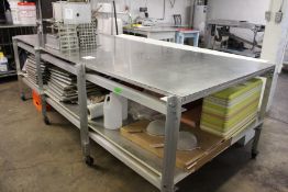 Stainless steel work table 5' wide x 10' long x 37"" high CONTENTS NOT INCLUDED