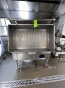 CLEVELAND TILTING BRAISING PAN, MOUNTED ON CASTERS, WITH HYDRAULIC LIFT