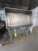 CLEVELAND TILTING BRAISING PAN, MOUNTED ON CASTERS, WITH HAND CRANK LIFT