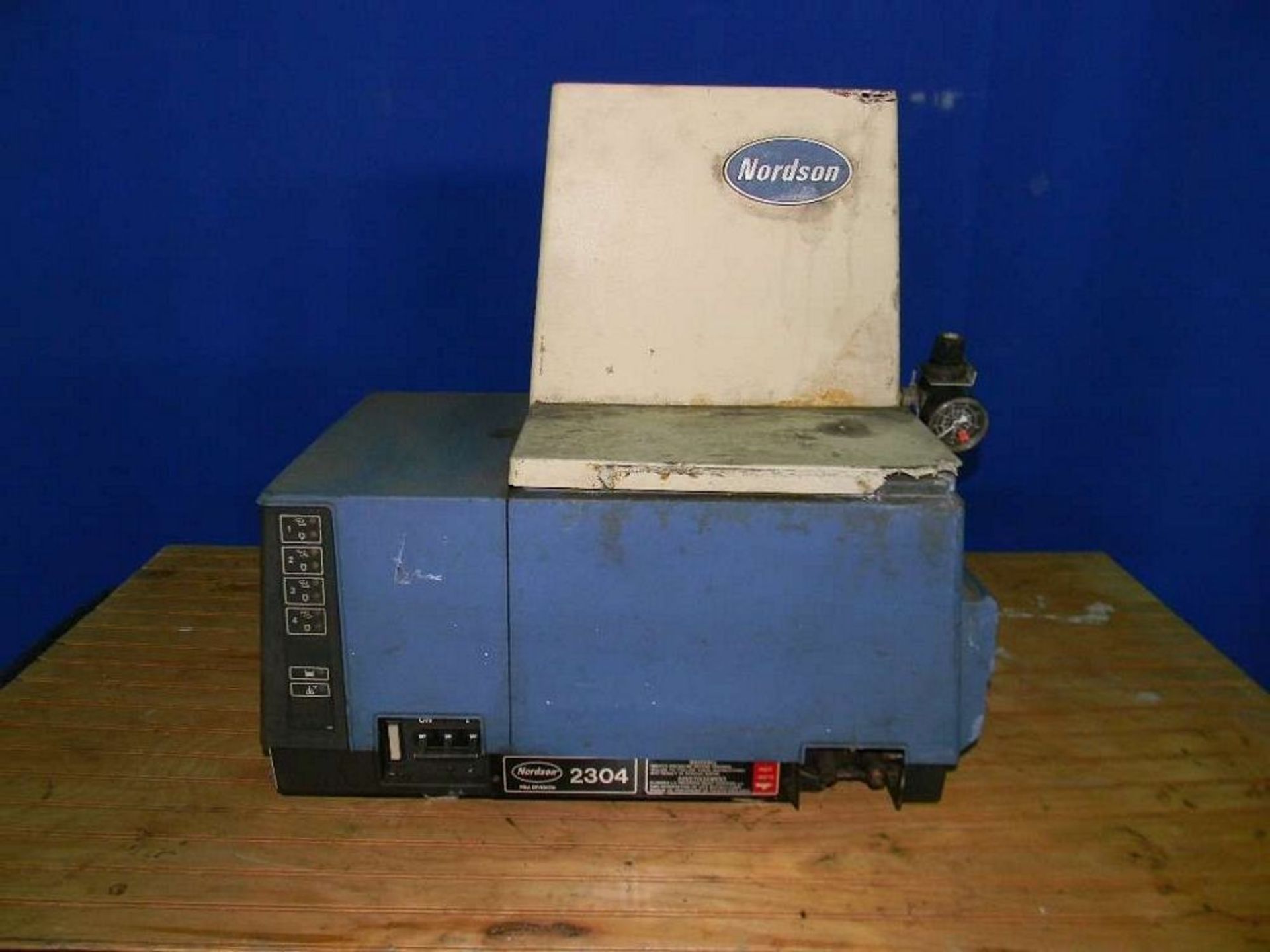 Qty (1) Nordson 2304 Hot Melt Glue System - Capable of running 4 hot melt gun assemblies - 240V,