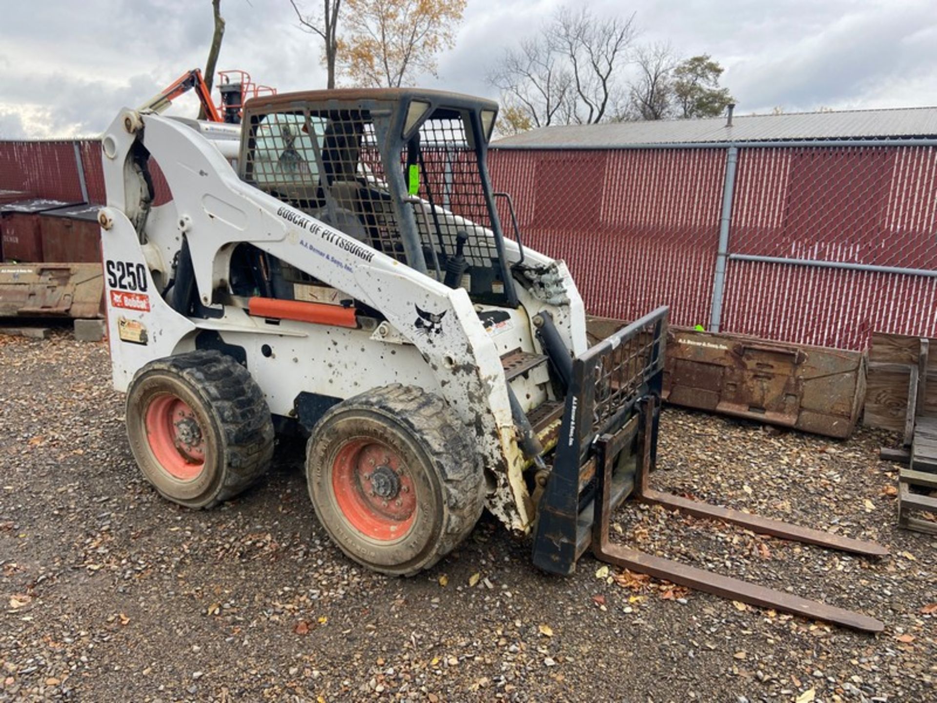 2010 Bobcat S250 Compact Skid Steer, VIN#: A5GM36985, with Fork Attachment (NOTE: DELAYED REMOVAL