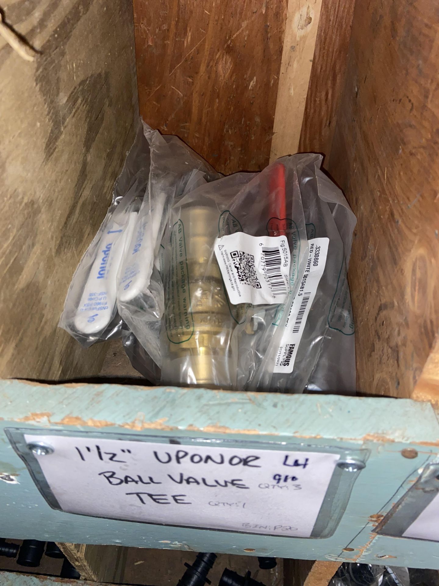 (1) 90” 1 1/2” Uponor; (8) 45” 1 1/2” Uponor; (3) 1 1/2” Uponor Ball Valve Tee (LOCATED IN