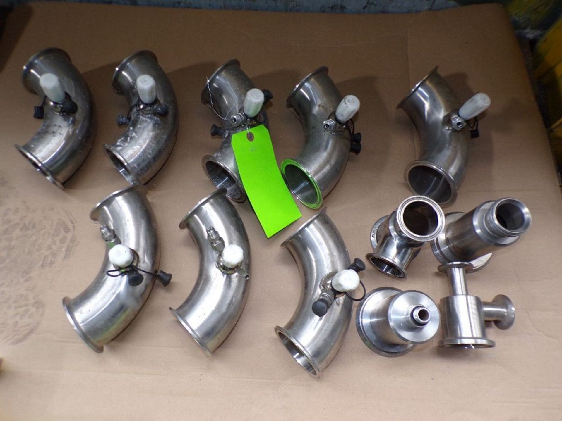 Qty (12) 3 inch sanitary stainless elbows with relief valves; (2) 3 inch valve bodies; (1) 2 inch