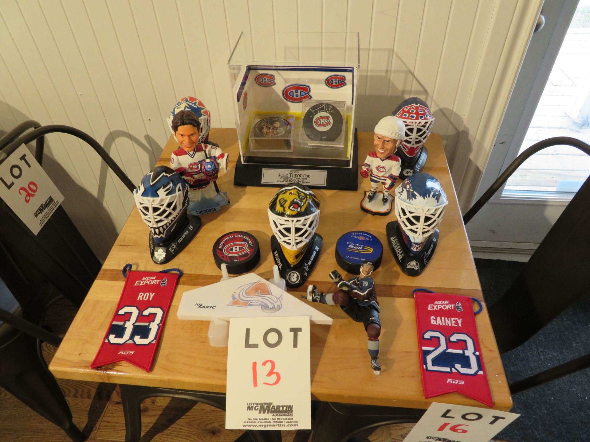 LOT including hockey memorabilia (signed) Jose Theodore puck, etc.