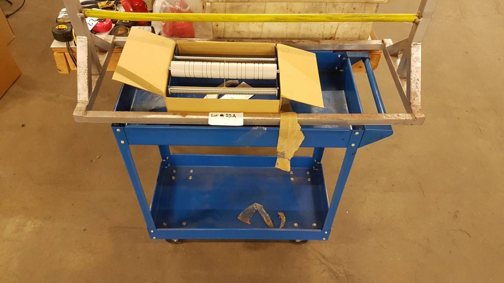 2 label dispensers and rolling cart