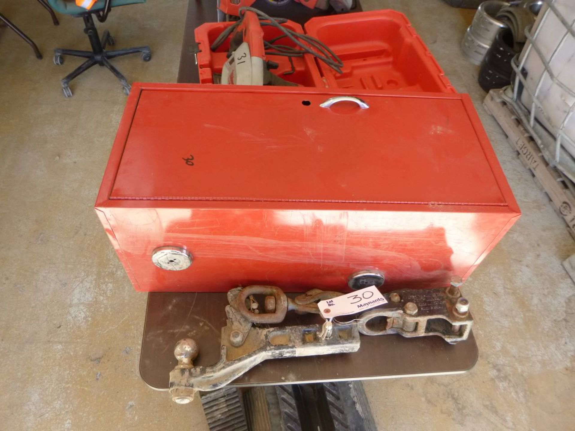 Tool box with chocks and hitch parts