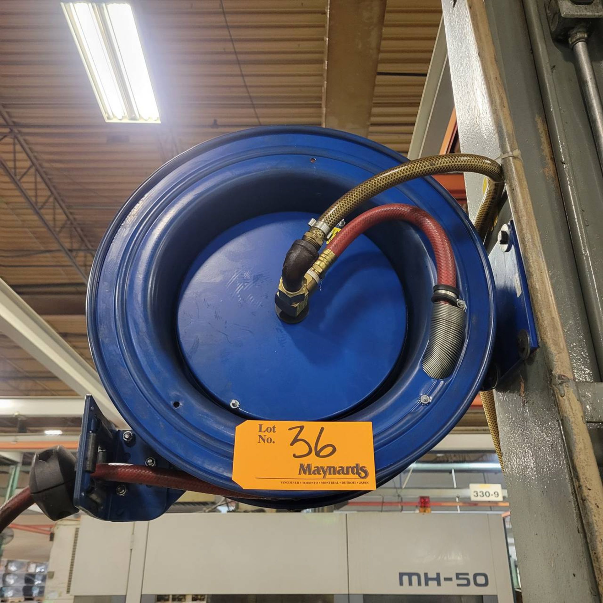 Coxreels Blue retractable air hose reel