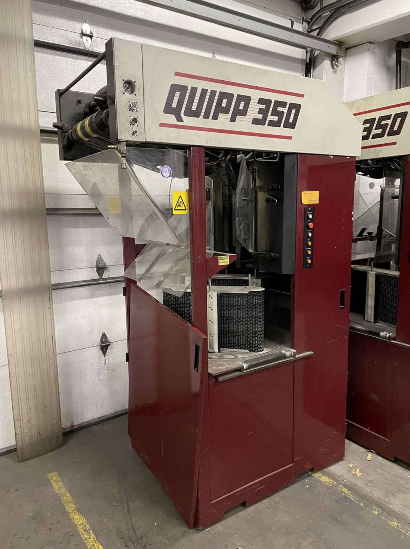 Quipp 350 Newspaper Stacker