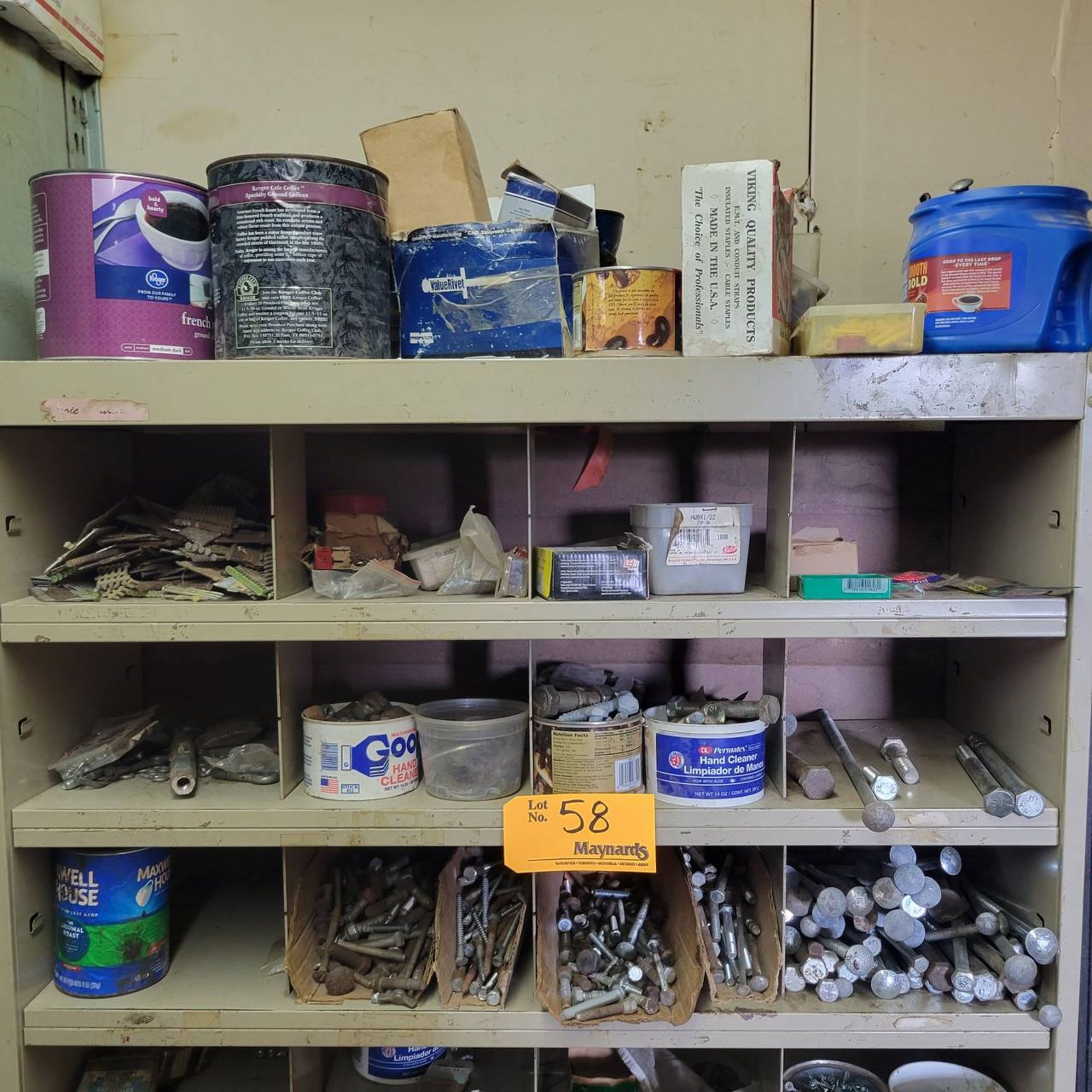 Lot of hardware, fasteners, nails and fittings on shelf