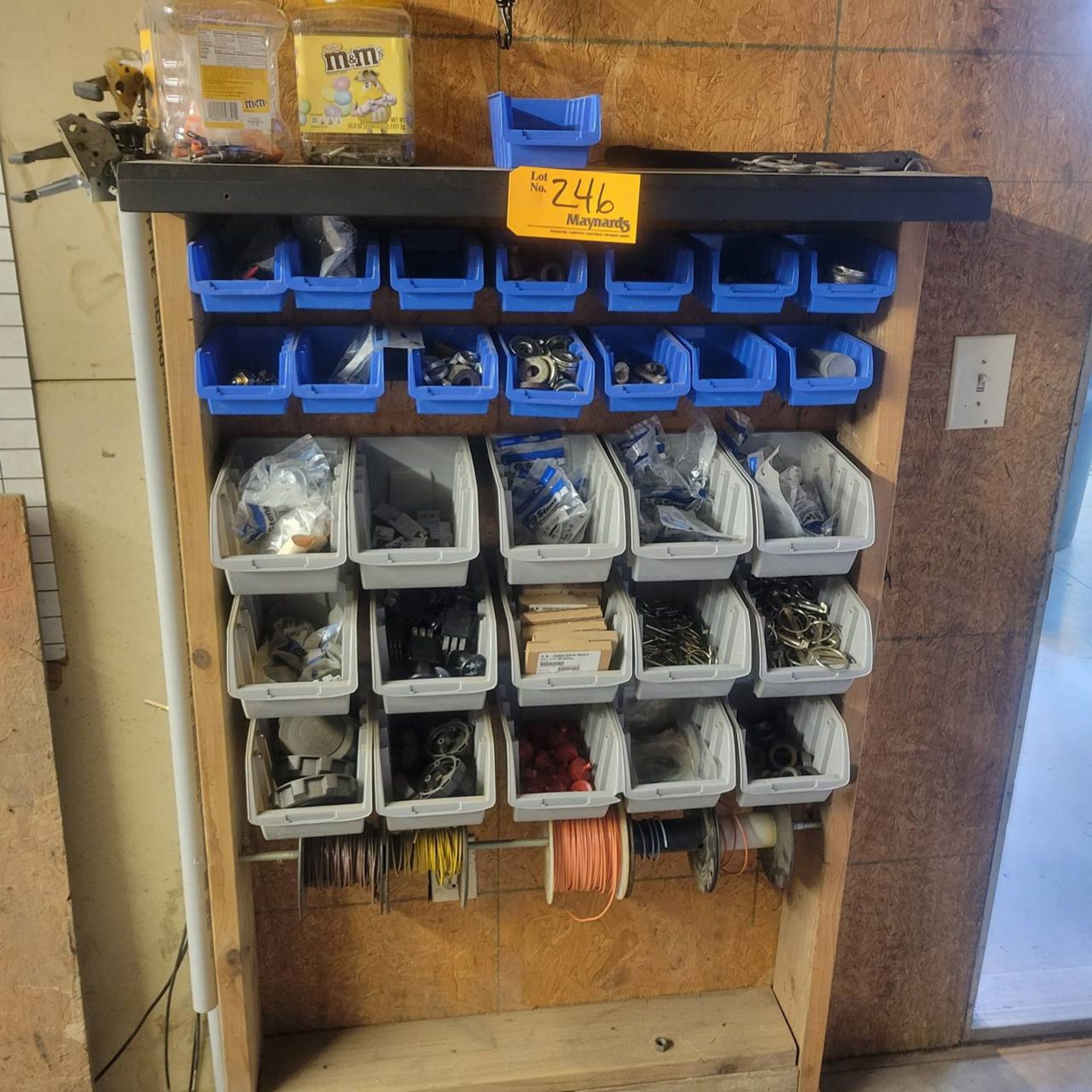 Lot of mower parts on shelf