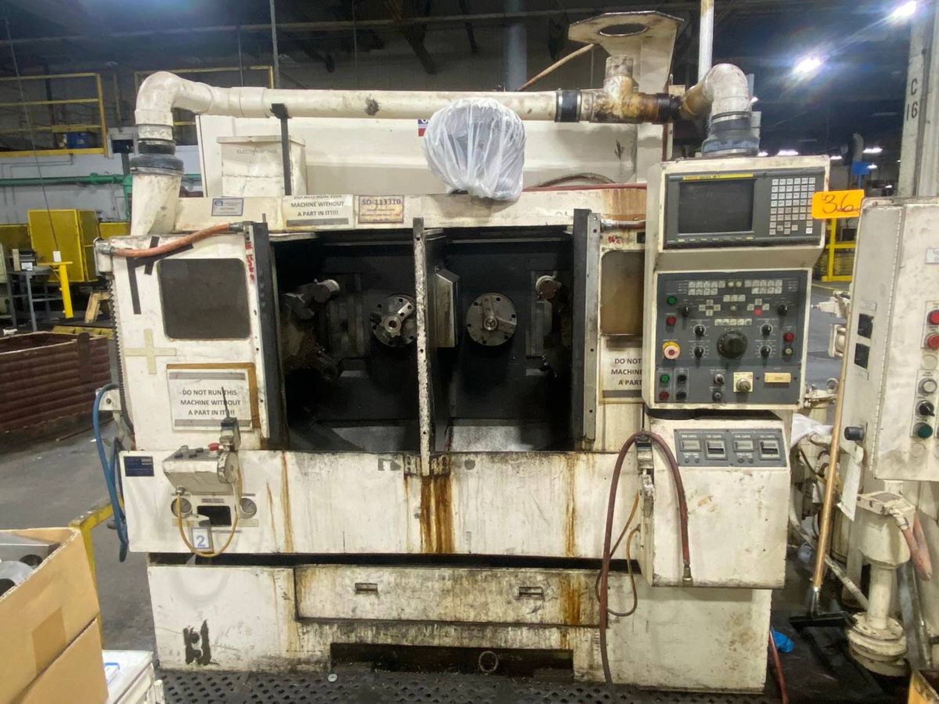 OKUMA & HOWER 2SP-25H CNC LATHE