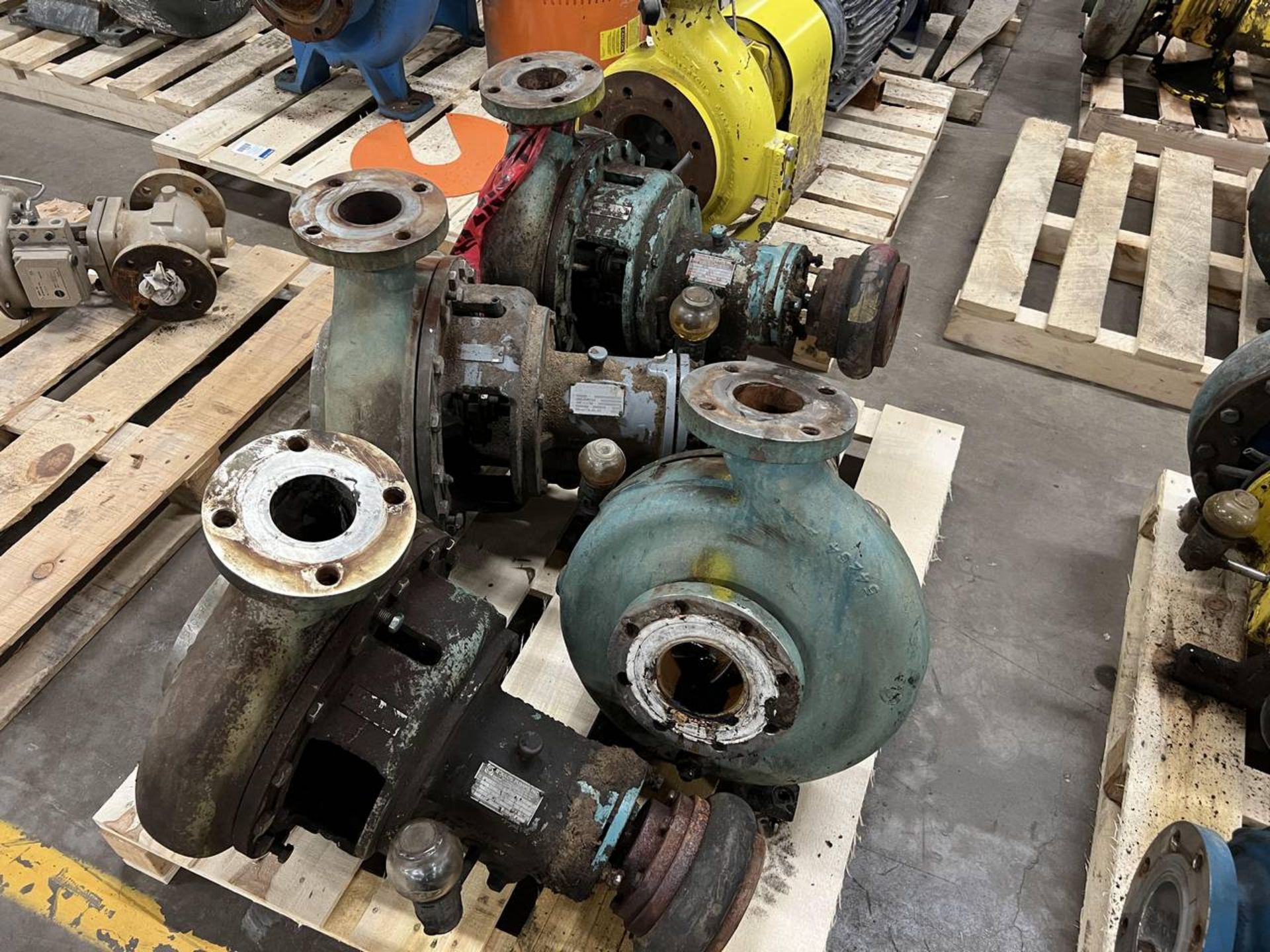 SKID OF (4) STAINLESS STEEL GOULDS PUMPS