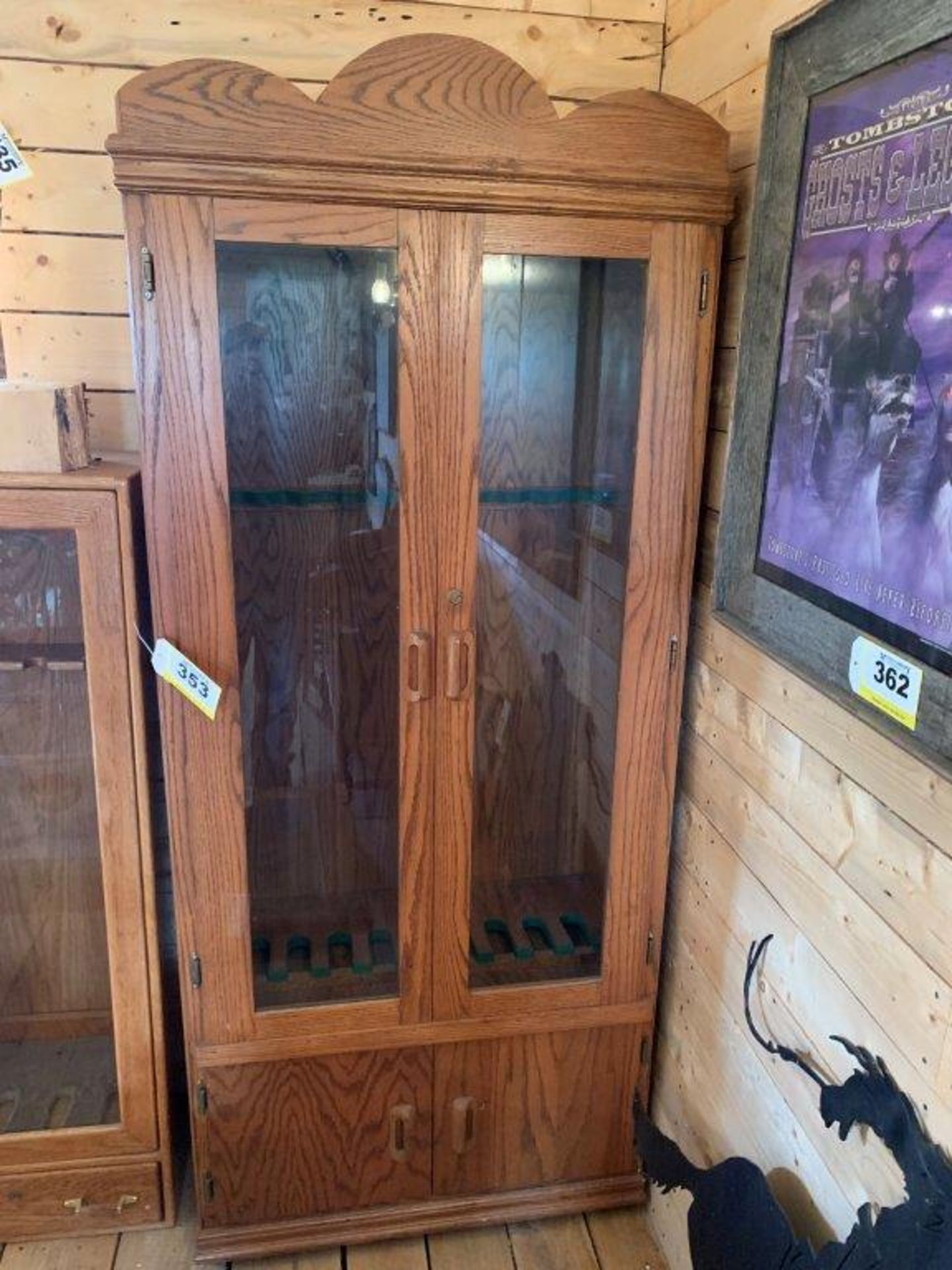 OAK AND GLASS NINE POSTITION GUN STORAGE CABINET