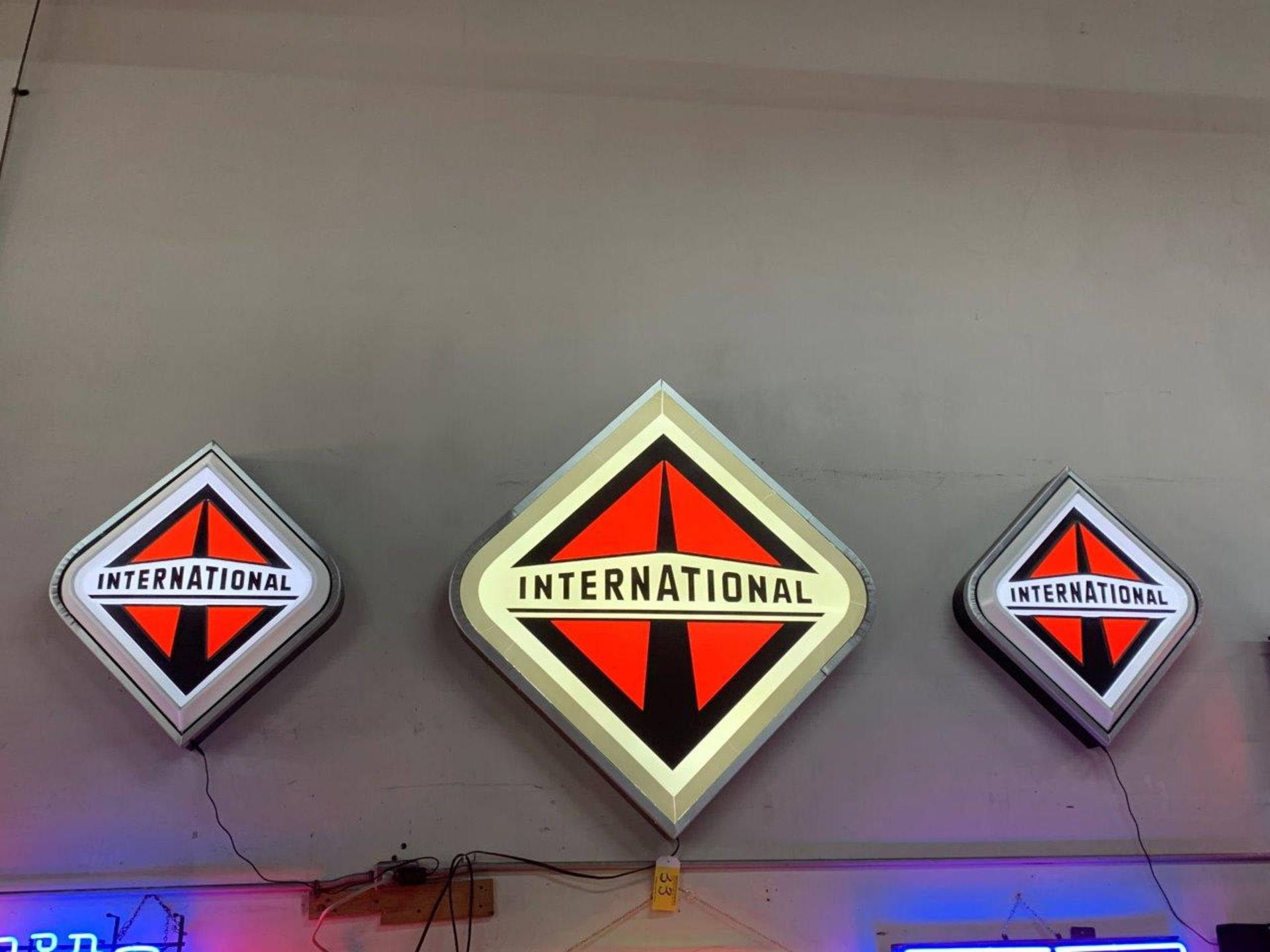 SET OF 3 INTERNATIONAL TRUCK LIGHTED SIGNS