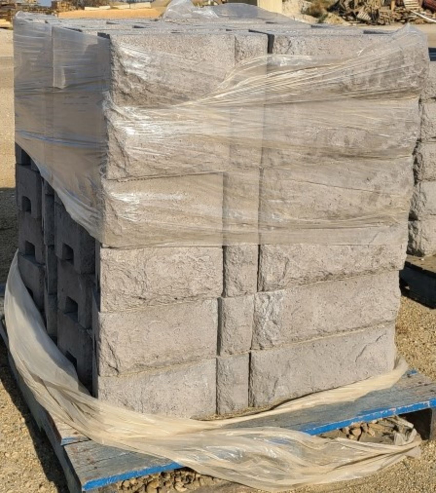 PALLET OF INTERLOCKING RETAINING WALL BLOCKS - This Lot is Located at D&M Concrete West from Lacombe