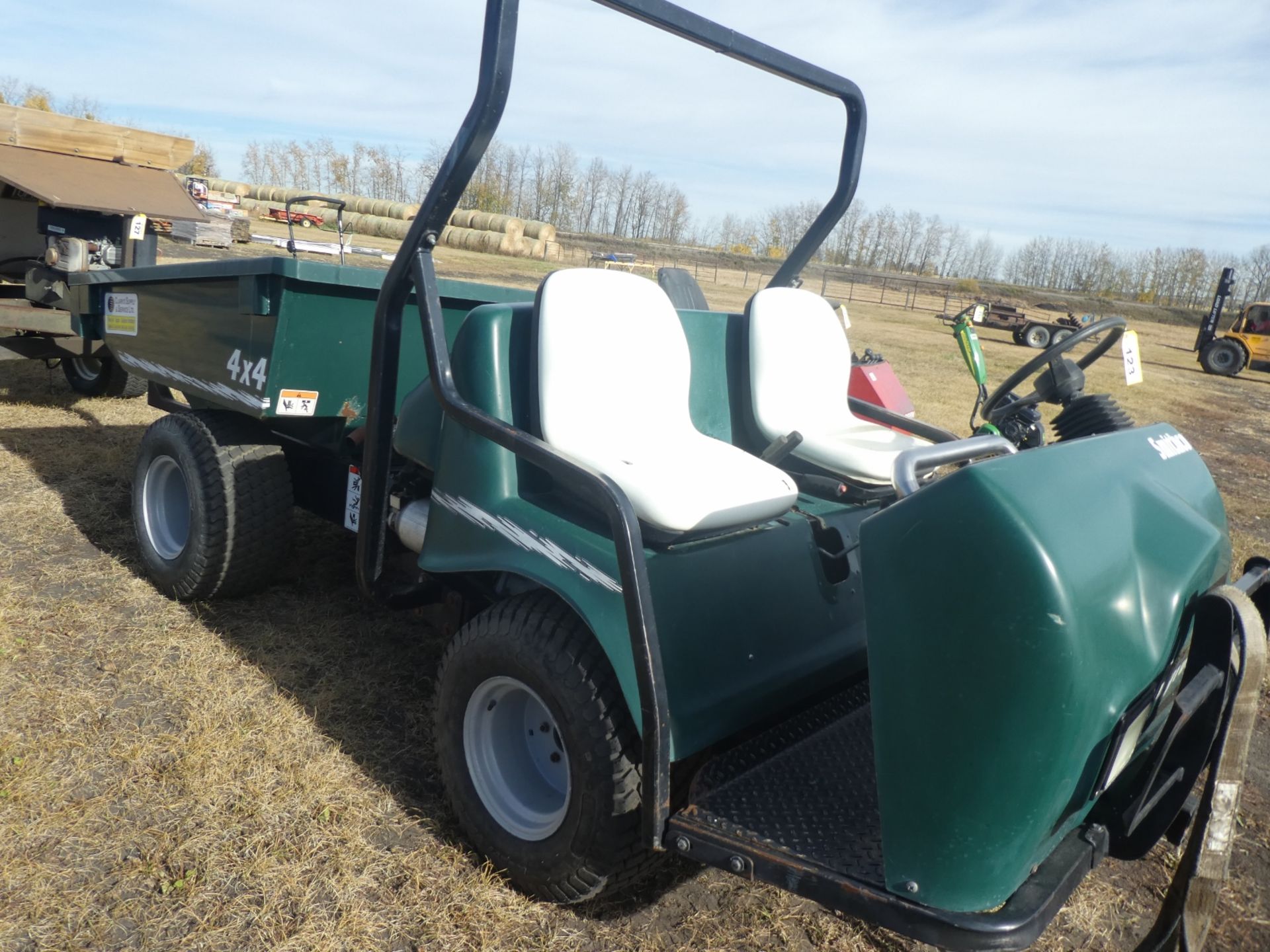 2002 SMITHCO BIGFOOT ARTICULATING UTILITY VEHICLE, 4X4, 680KG HYD. DUMP, 20 HP KOHLER GAS ENG.,