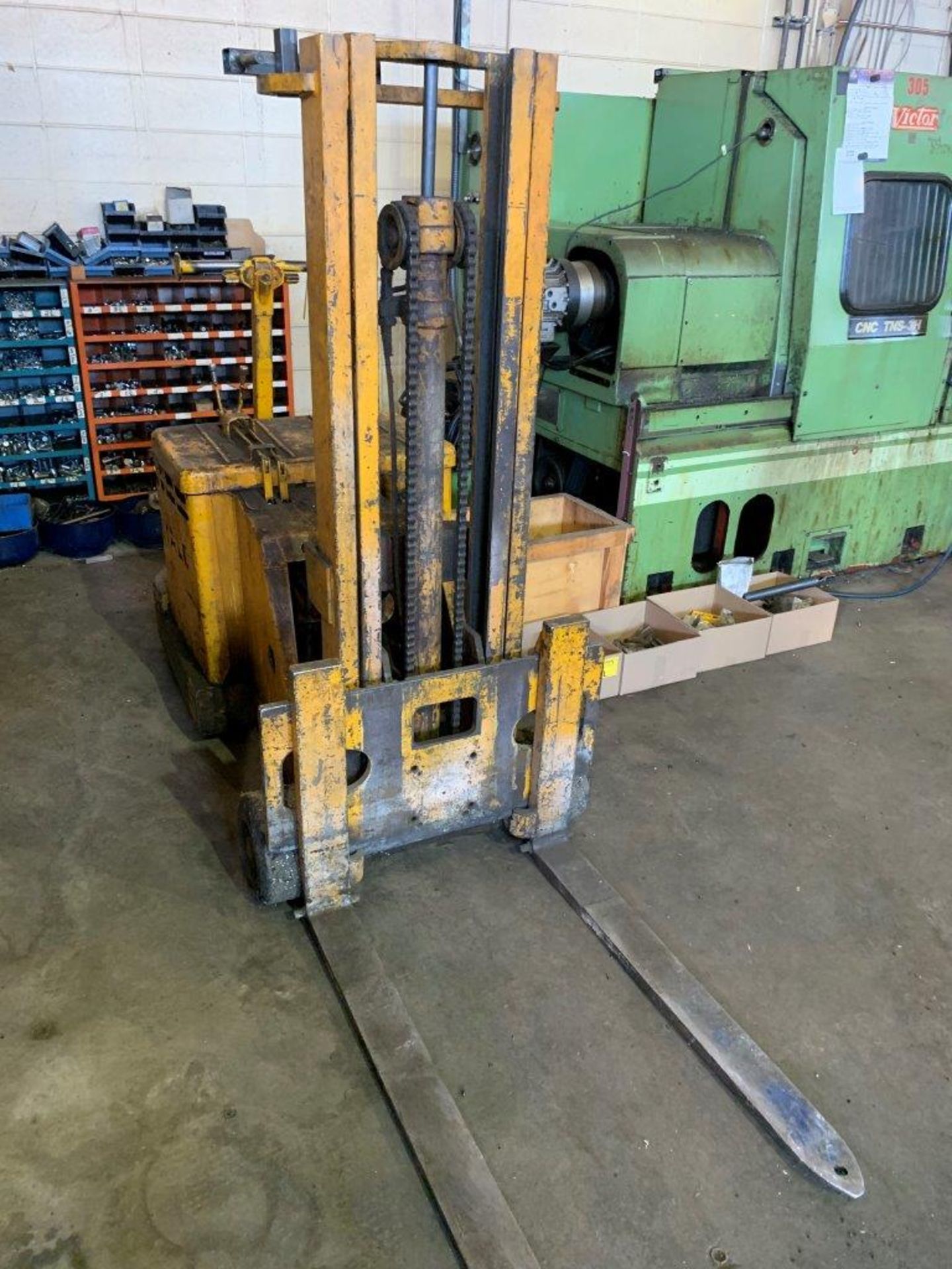 YALE WALK BEHIND ELECTRIC FORKLIFT, 2000 LB, W/ CHARGER. WORKING WELL