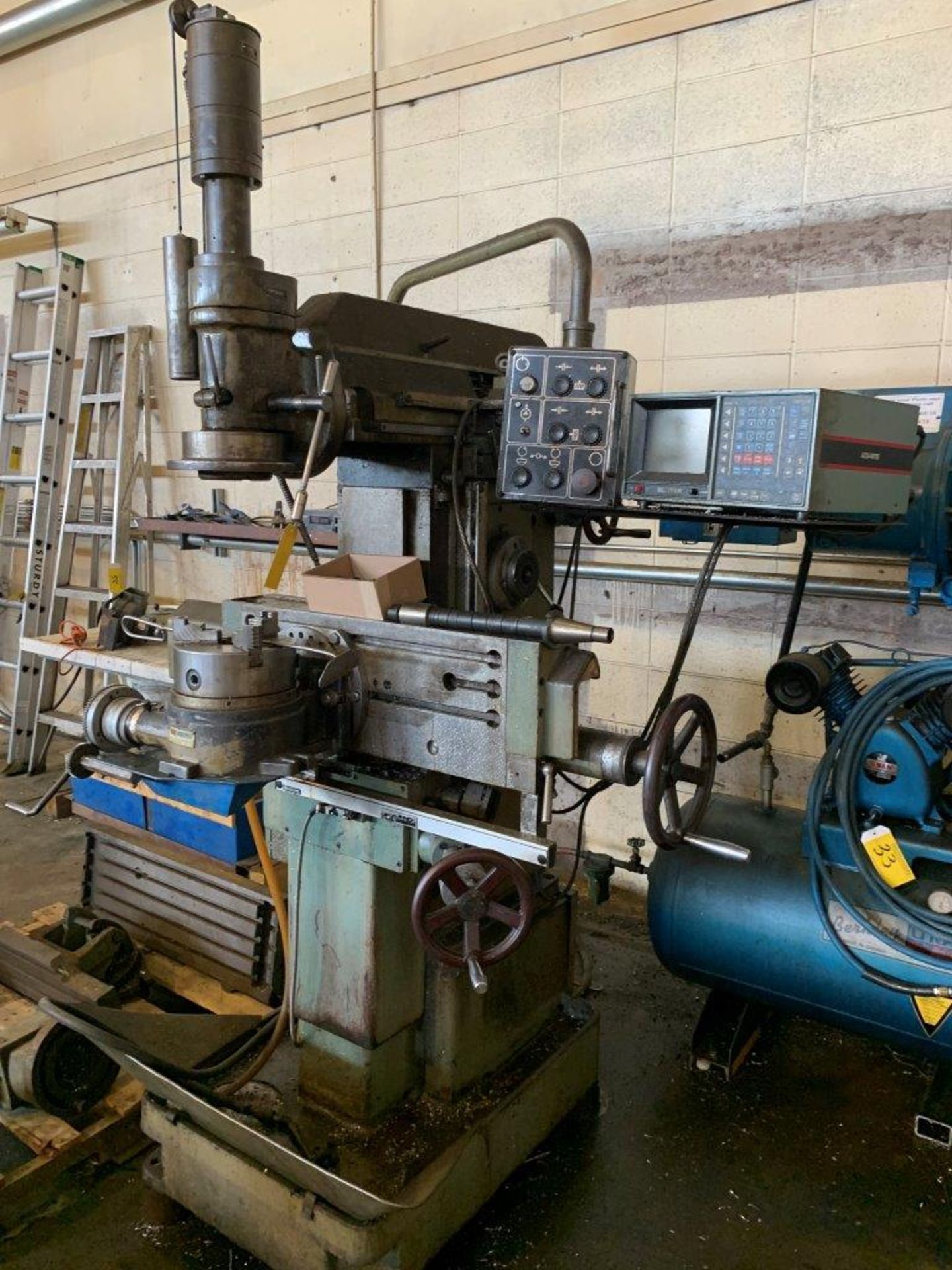 1991 STANKO DECKEL TYPE MILL W/INDEXING CHUCK, PLUS 2-BOLT ON TABLES C/W TOOLING AND EXTRA TABLES.