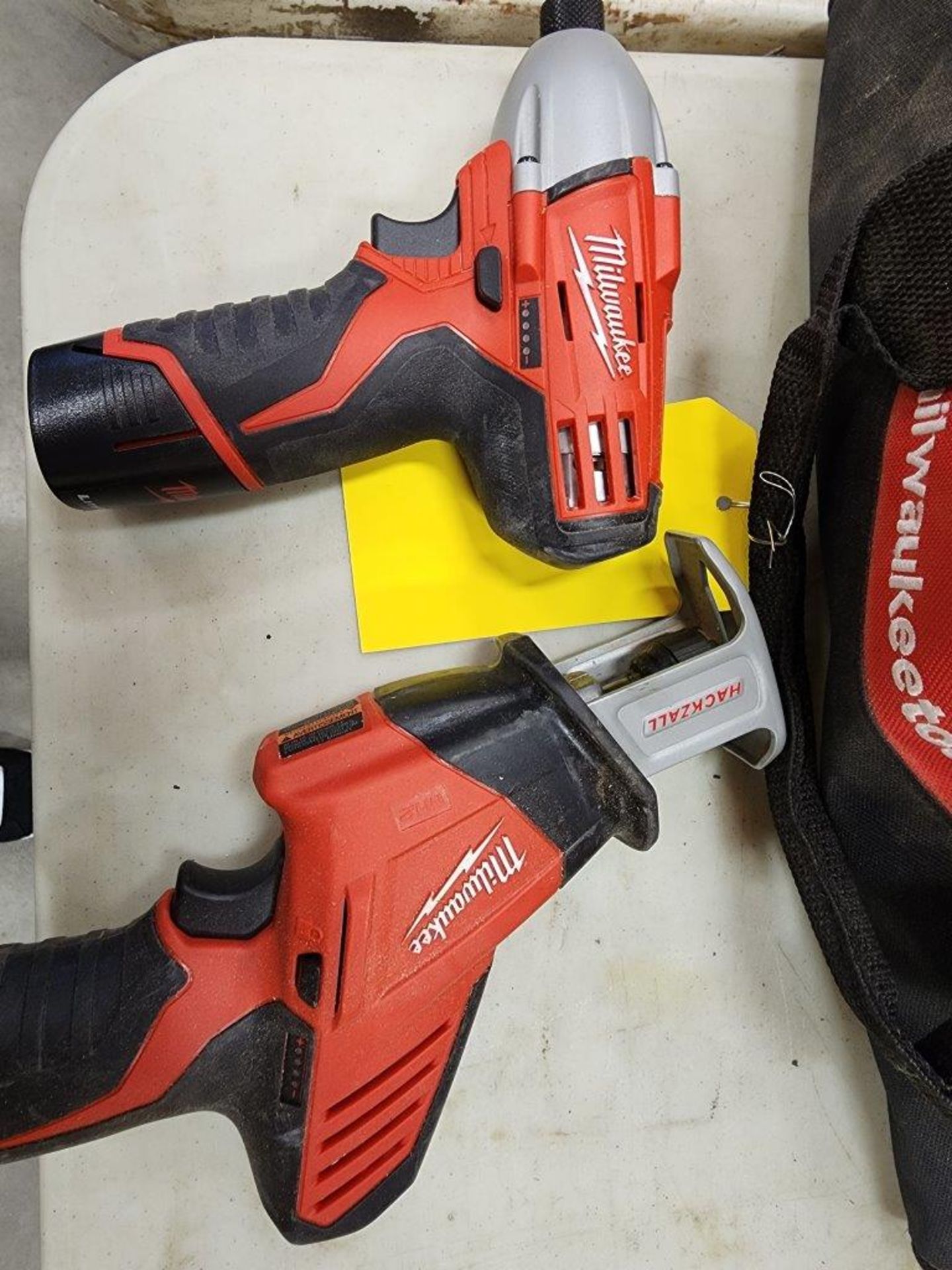 MILWAUKEE 12V CORDLESS HACK SAW AND IMPACT DRILL - Image 3 of 3