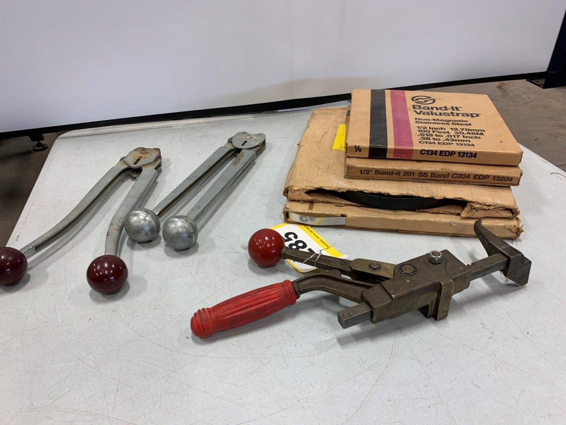 ASSORTED BANDING TOOLS AND BANDING