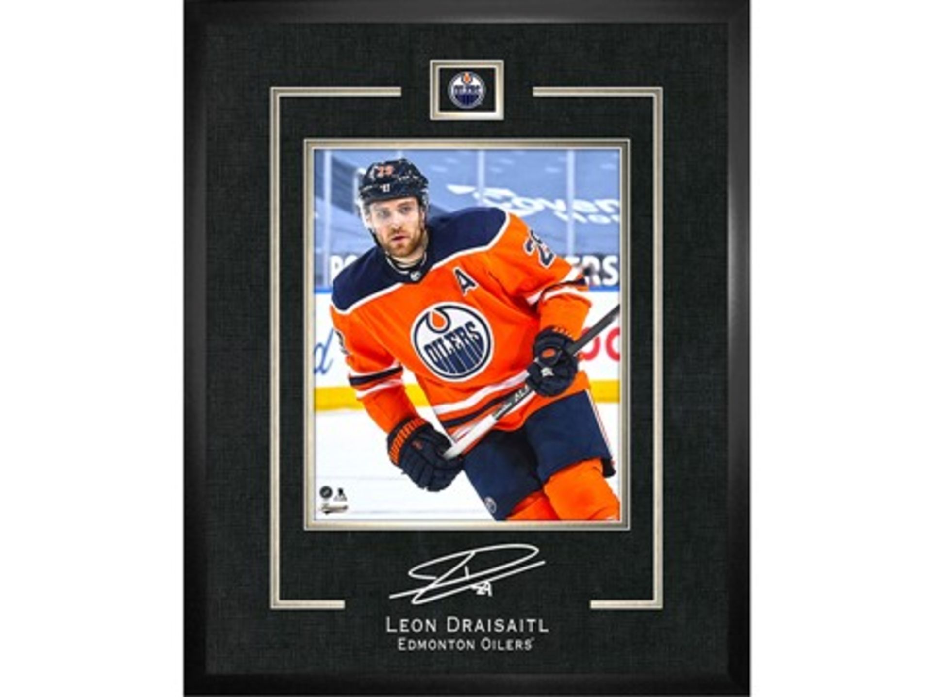 Leon Draisaitl framed action shot w/ replica signature - Retail Value: $200 - Donated By: